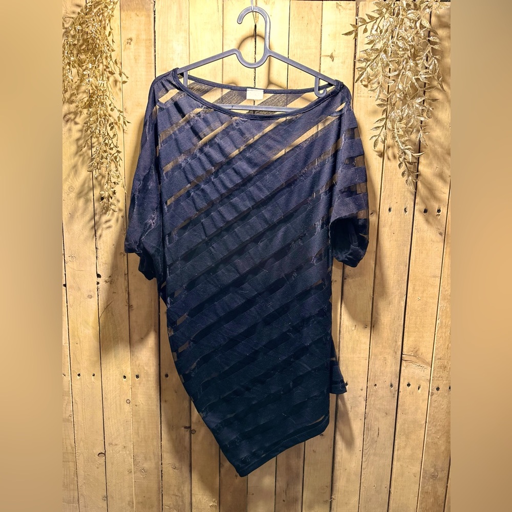 Off the shoulder t shirt.